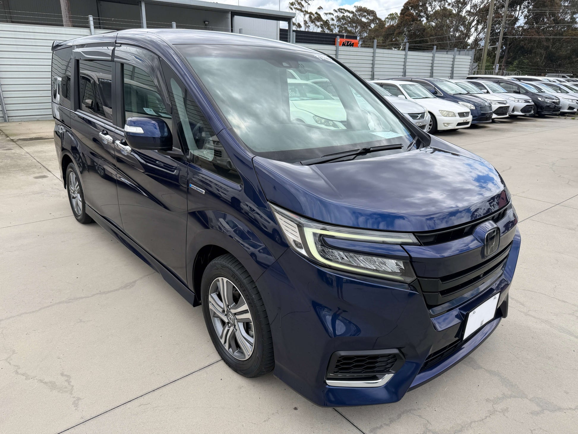 2018 Honda Honda Stepwgn 2.0 Spada Hybrid G EX Honda Sensing in blue, showcasing its sleek design and family-friendly features.