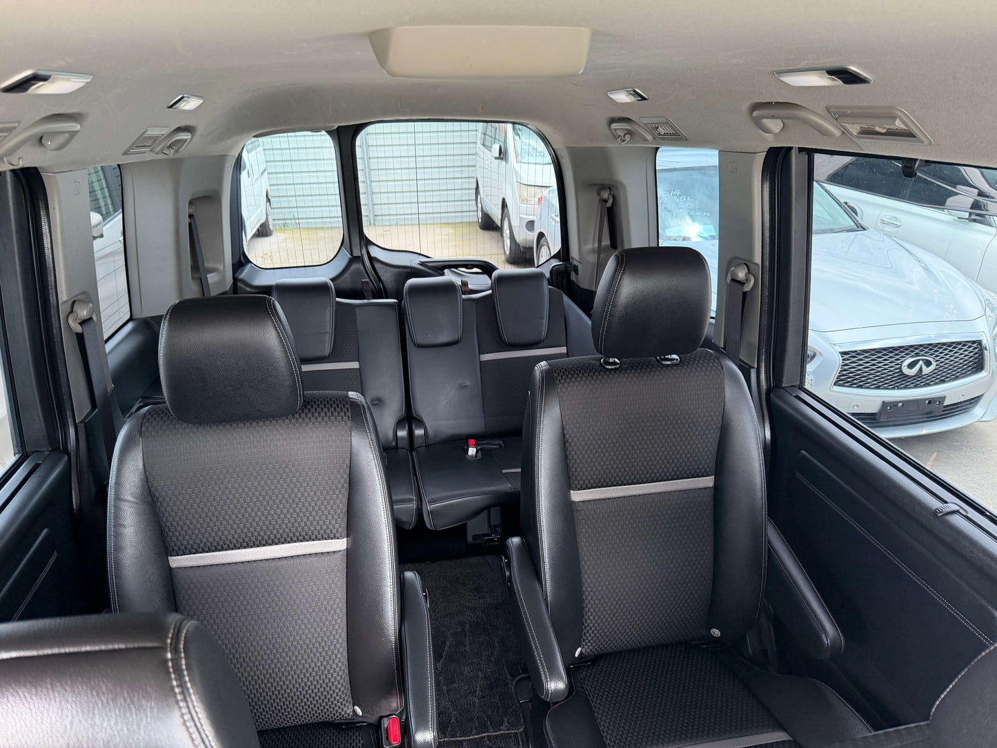 Interior view of the 2018 Honda Honda Stepwgn 2.0 Spada Hybrid G EX Honda Sensing, showcasing the spacious 7-seater layout.