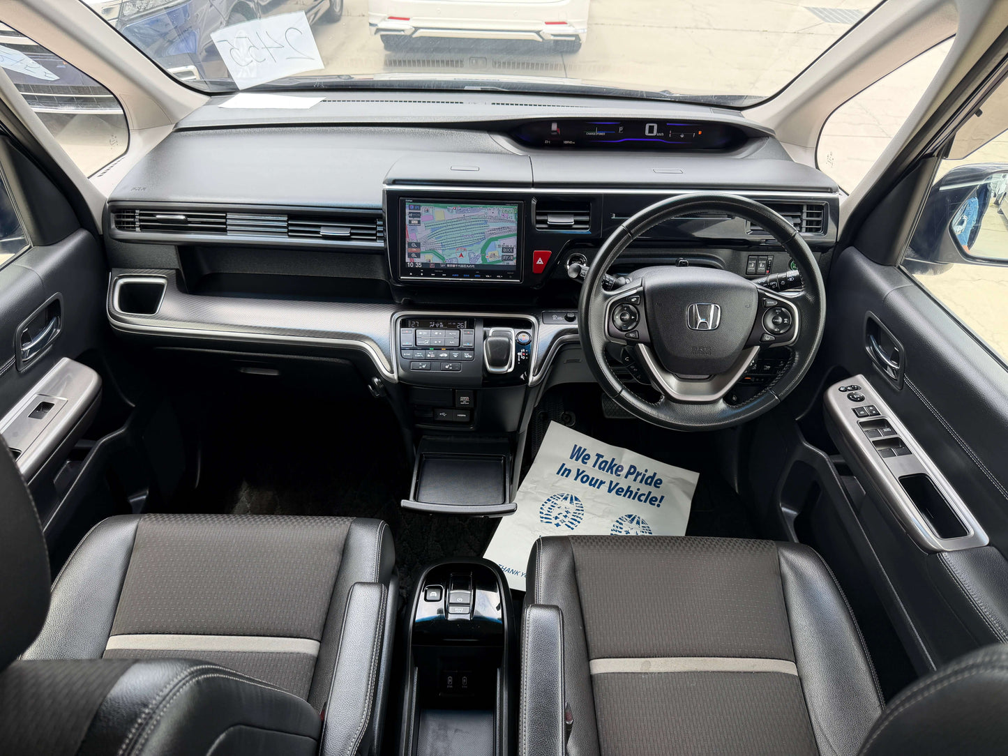 Interior view of 2018 Honda Honda Stepwgn 2.0 Spada Hybrid G EX Honda Sensing showcasing dashboard and seating.