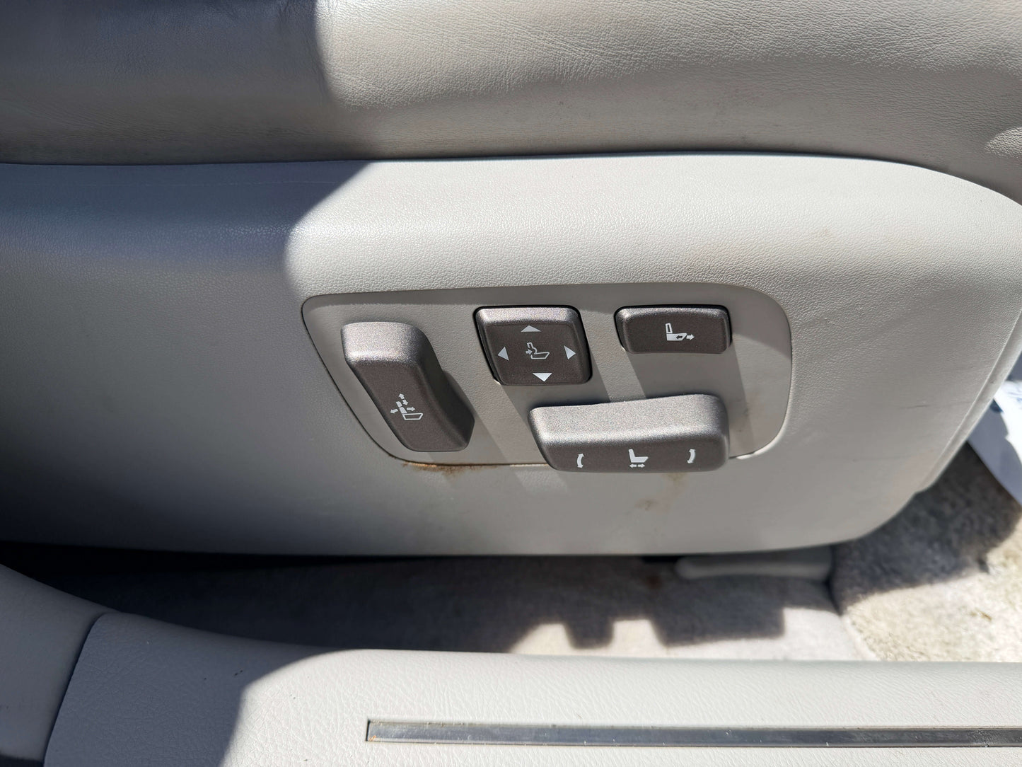 Control panel for adjustable seat functions in a 2007 Lexus LS600hL AWD V8 5.0L Hybrid Luxury Sedan.