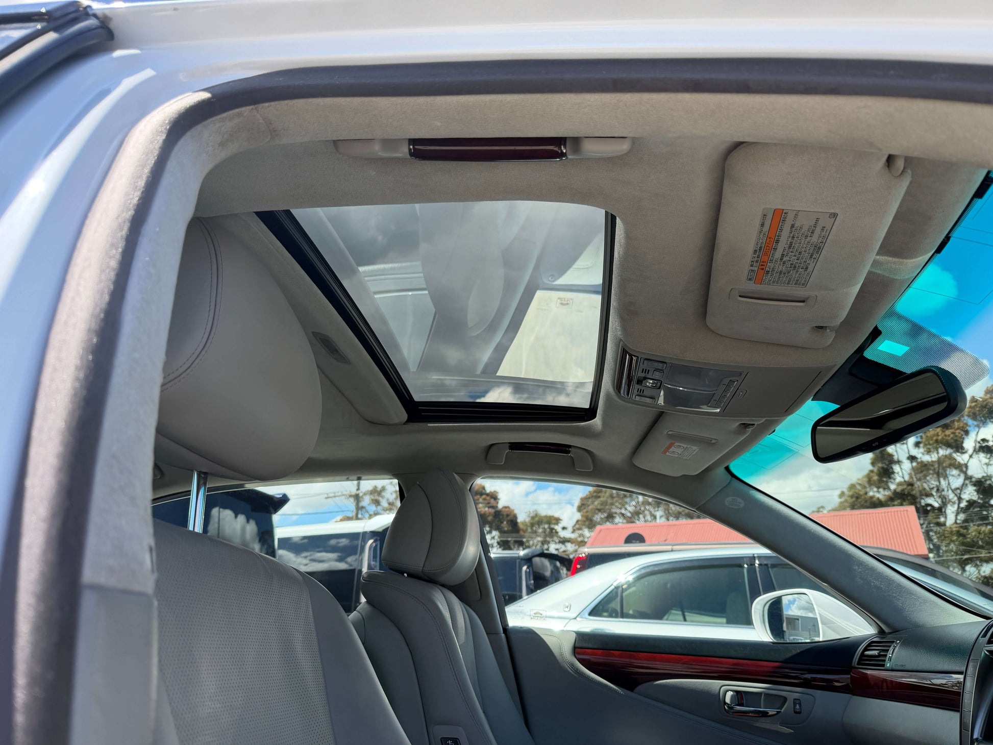 Interior view of the 2007 Lexus LS600hL AWD V8 5.0L Hybrid luxury sedan featuring a sunroof.