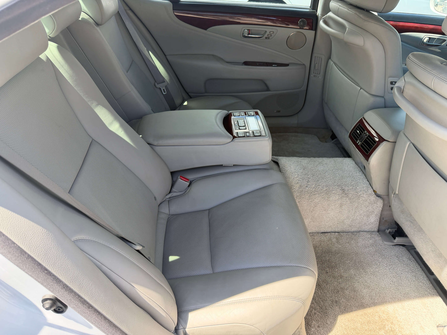 interior view of the backseat of a 2007 Lexus LS600hL AWD V8 5.0L Hybrid Luxury Sedan showcasing elegant design and spacious seating