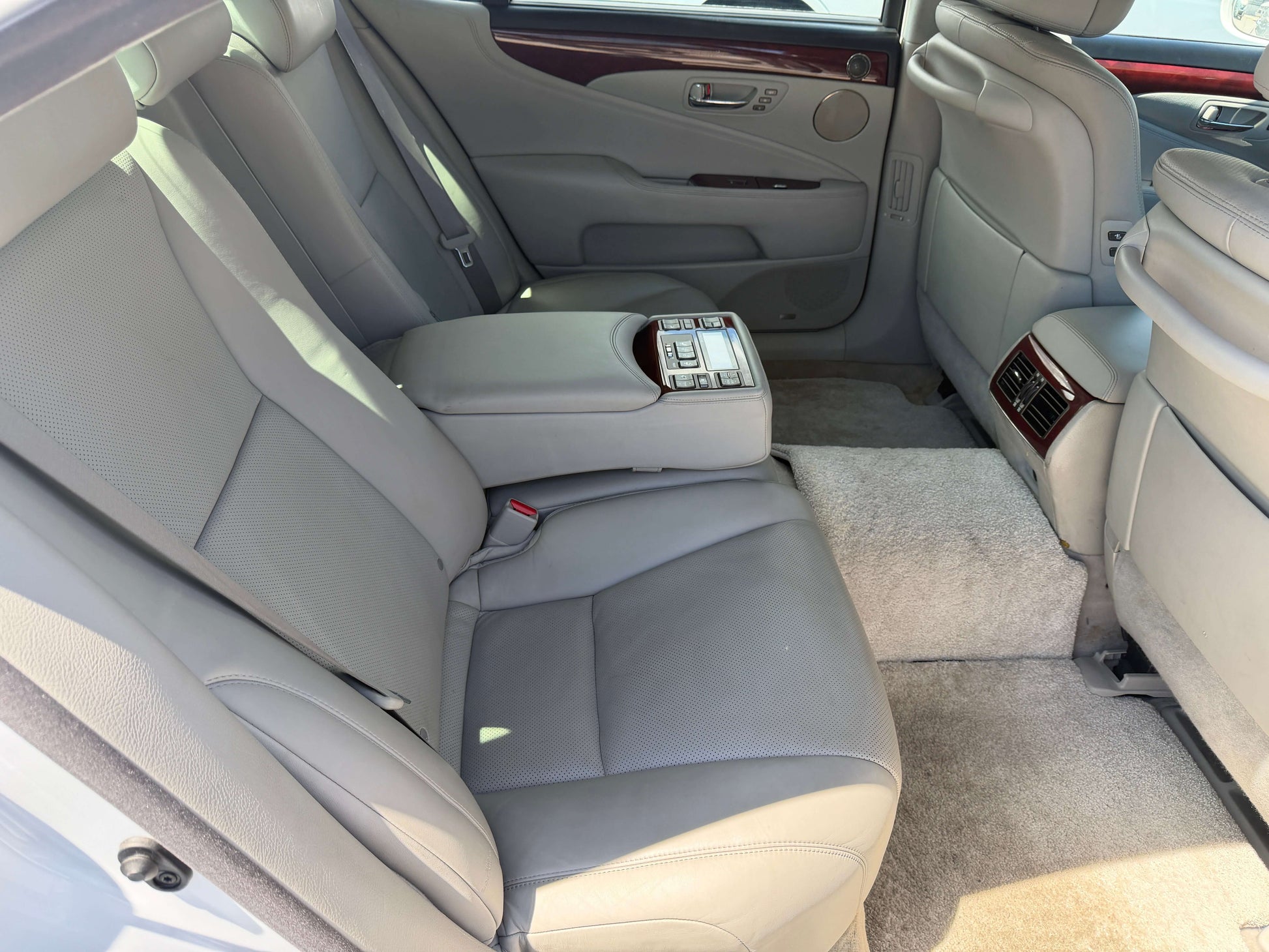 interior view of the backseat of a 2007 Lexus LS600hL AWD V8 5.0L Hybrid Luxury Sedan showcasing elegant design and spacious seating