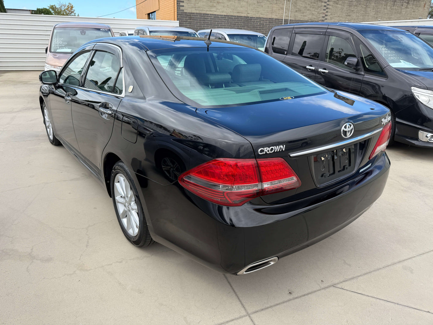 2008 Toyota Crown V6 3.0L Royal Saloon Edition Luxury Sedan, black exterior and light-grey interior, parked on lot.