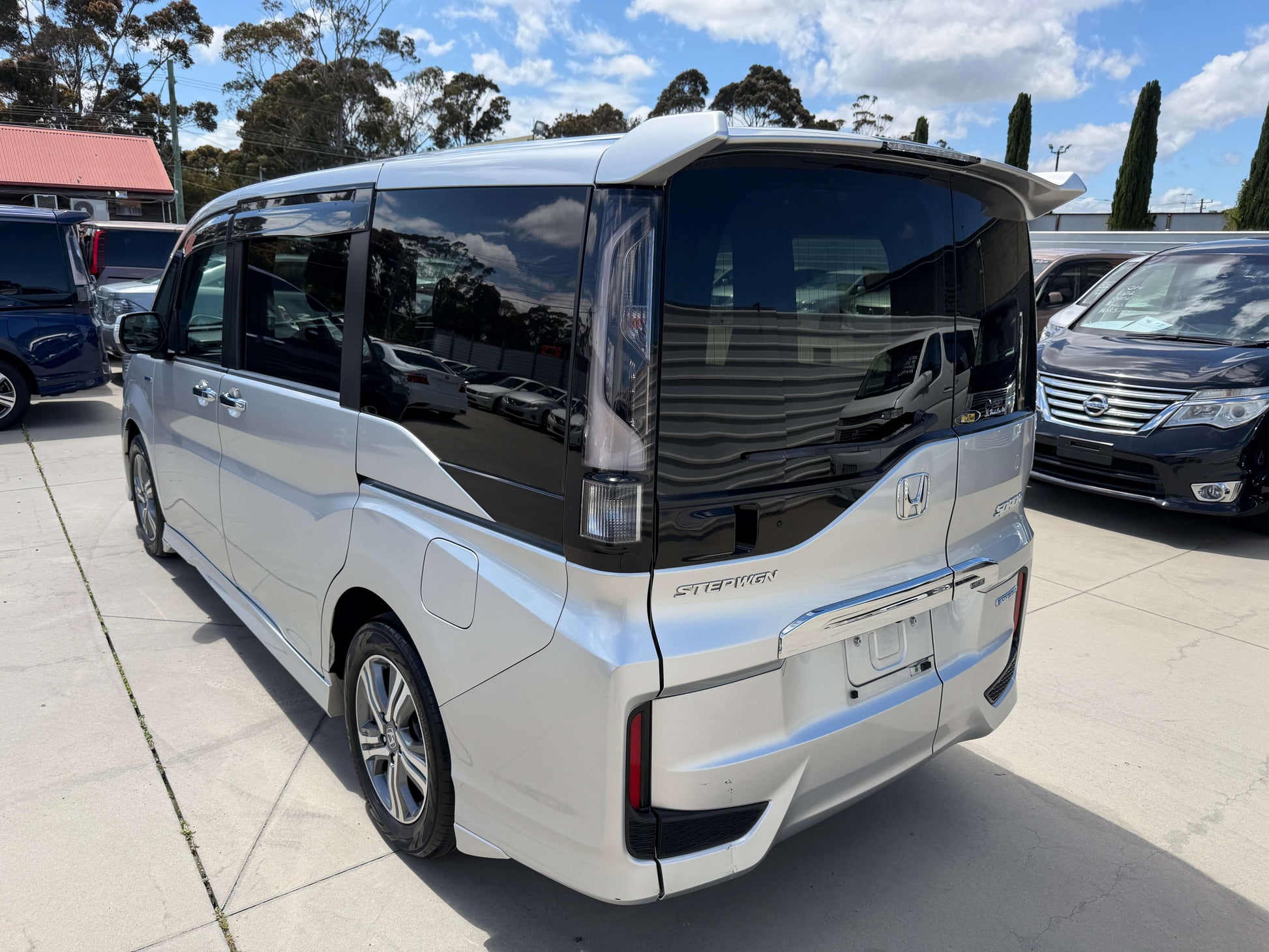 2019 Honda Honda Stepwgn 2.0 Spada Hybrid rear view showcasing sleek design and spacious layout