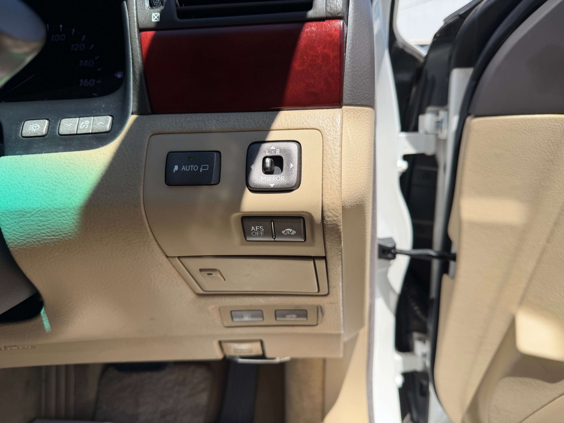 Interior controls of a 2007 Lexus LS600h AWD V8 5.0L Hybrid Luxury Sedan, showcasing luxury features.