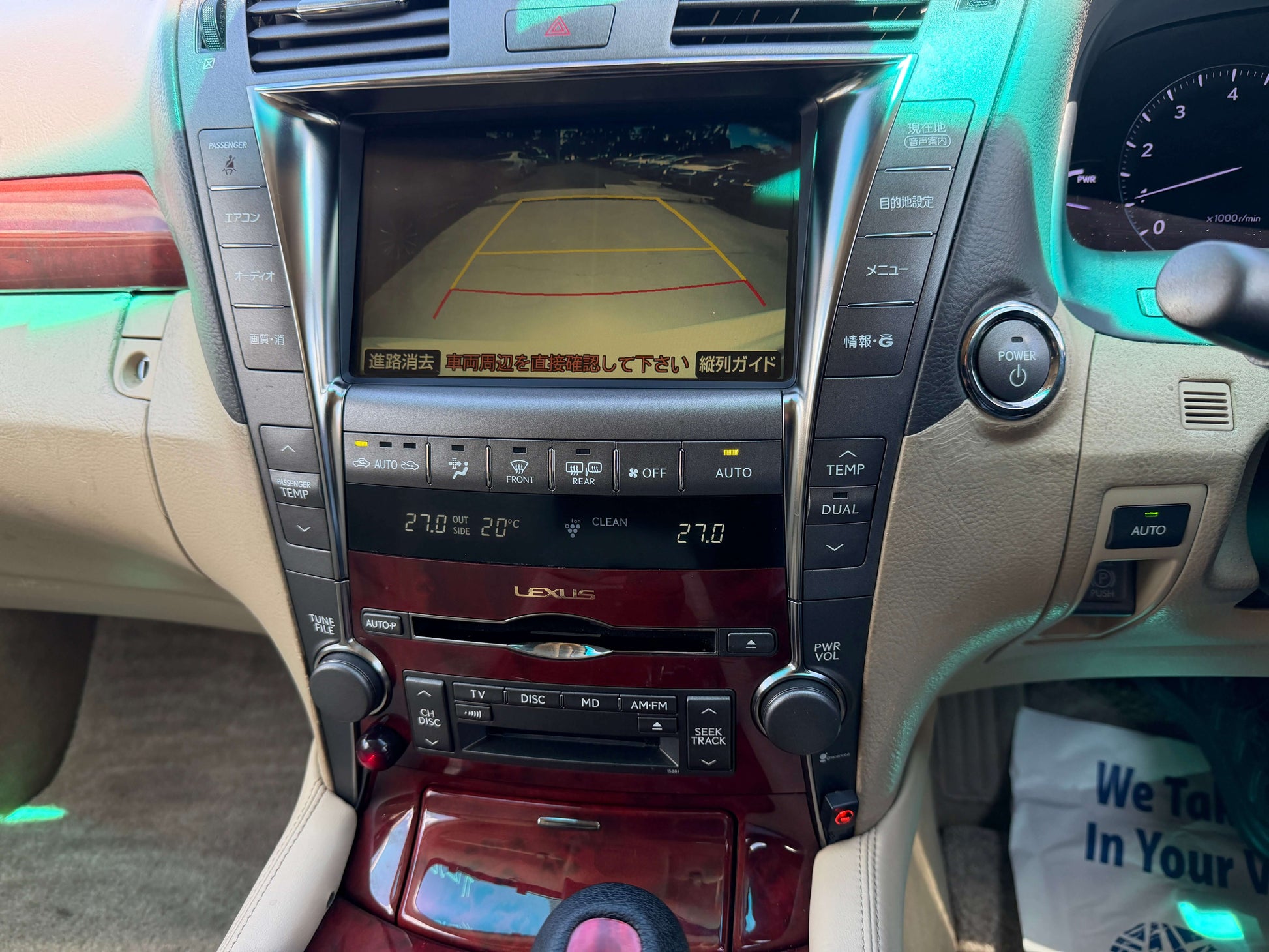 Interior dashboard display of a 2007 Lexus LS600h AWD V8 5.0L Hybrid with navigation and climate controls.