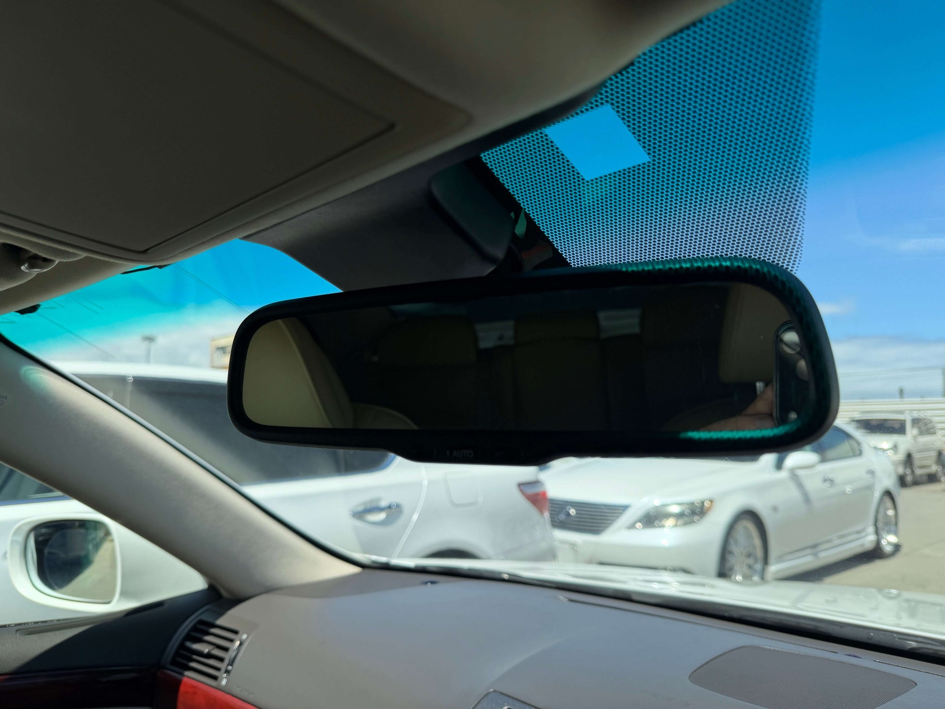 Interior view of the rearview mirror in a 2007 Lexus LS600h AWD V8 5.0L Hybrid luxury sedan.