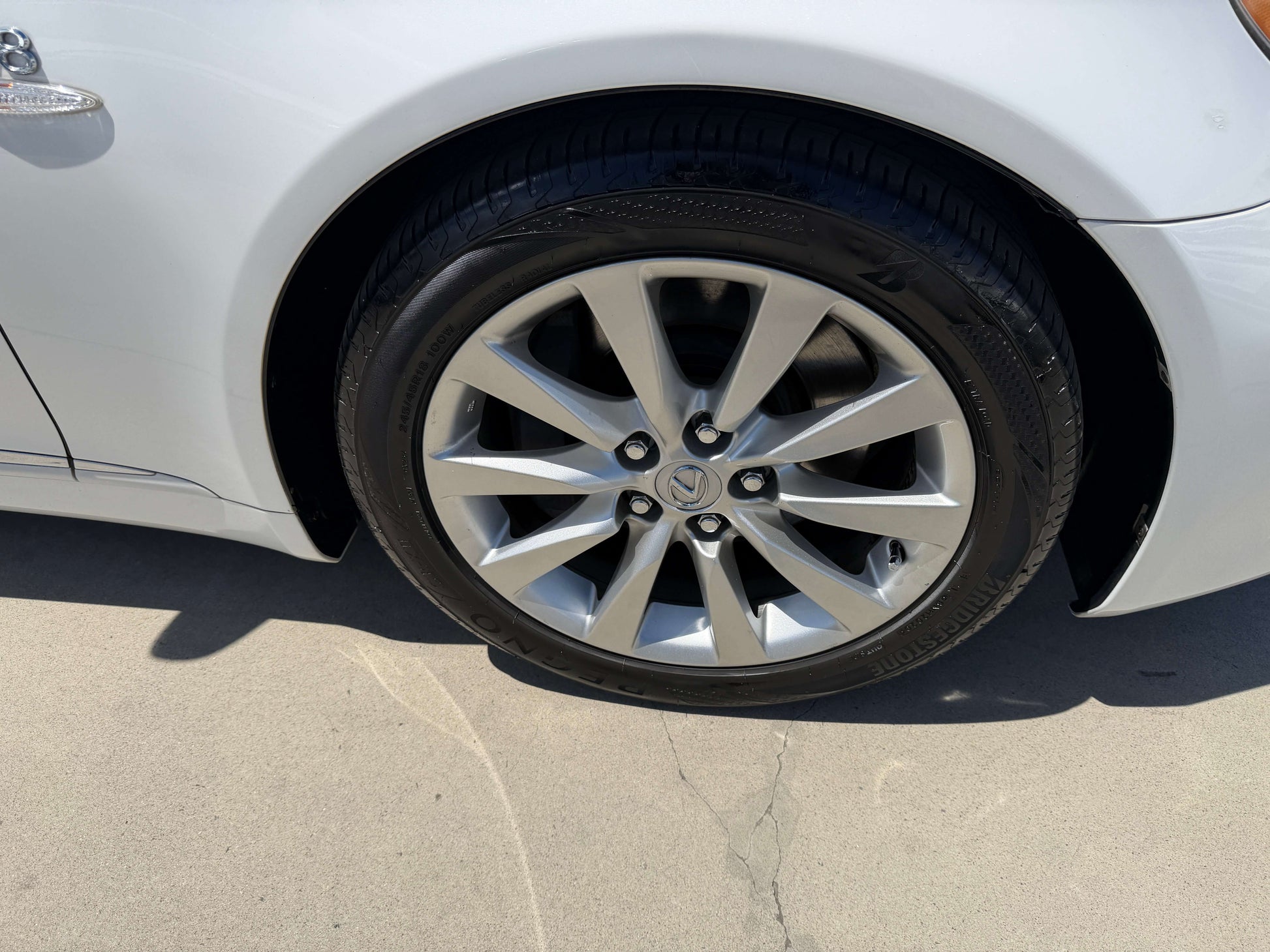 2007 Lexus LS600h AWD V8 5.0L Hybrid luxury sedan close-up of alloy wheel and tire.