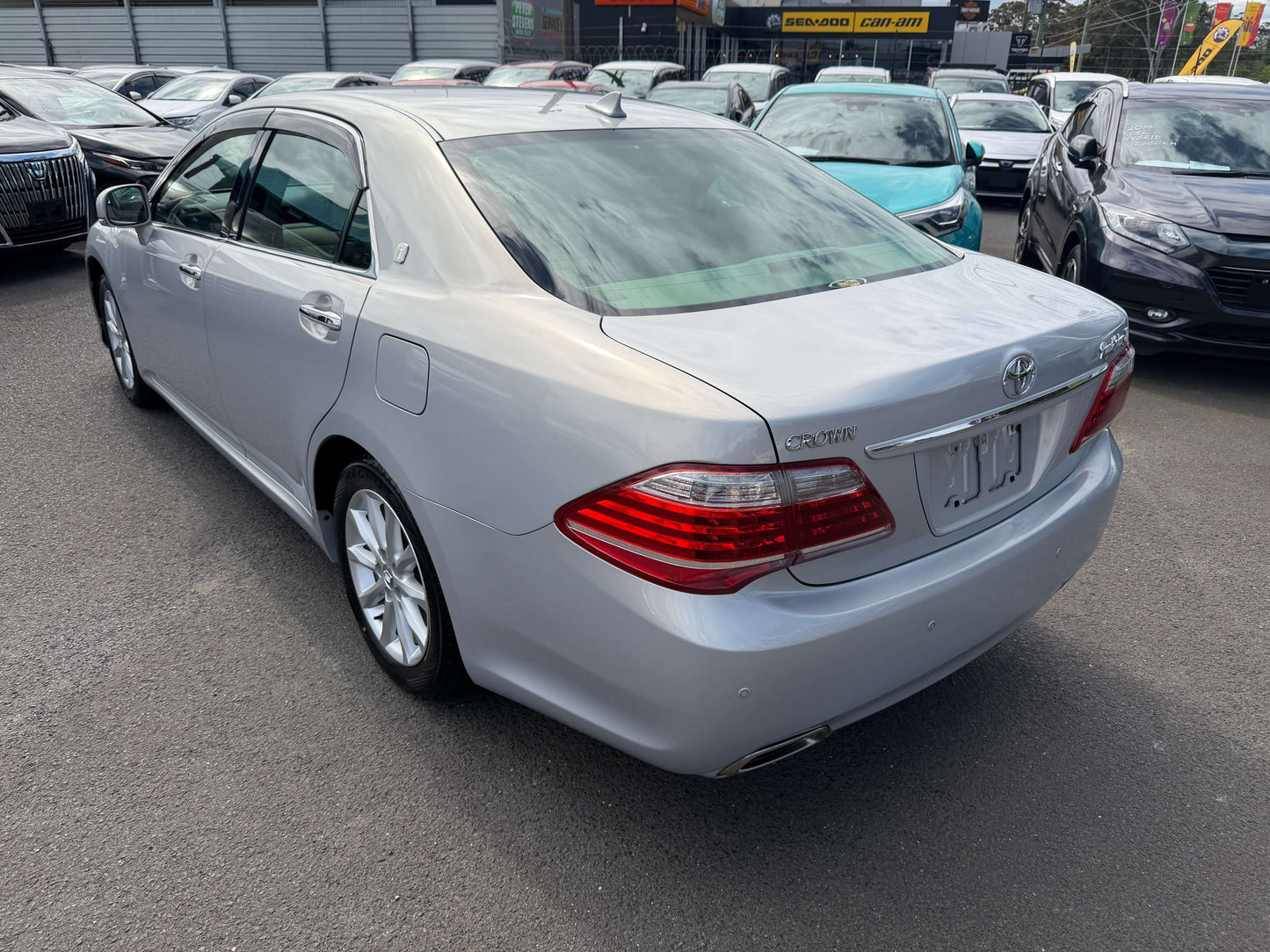 2010 Toyota Crown V6 3.0L Royal Saloon G Edition Luxury Sedan rear view showcasing sleek design and elegant features.