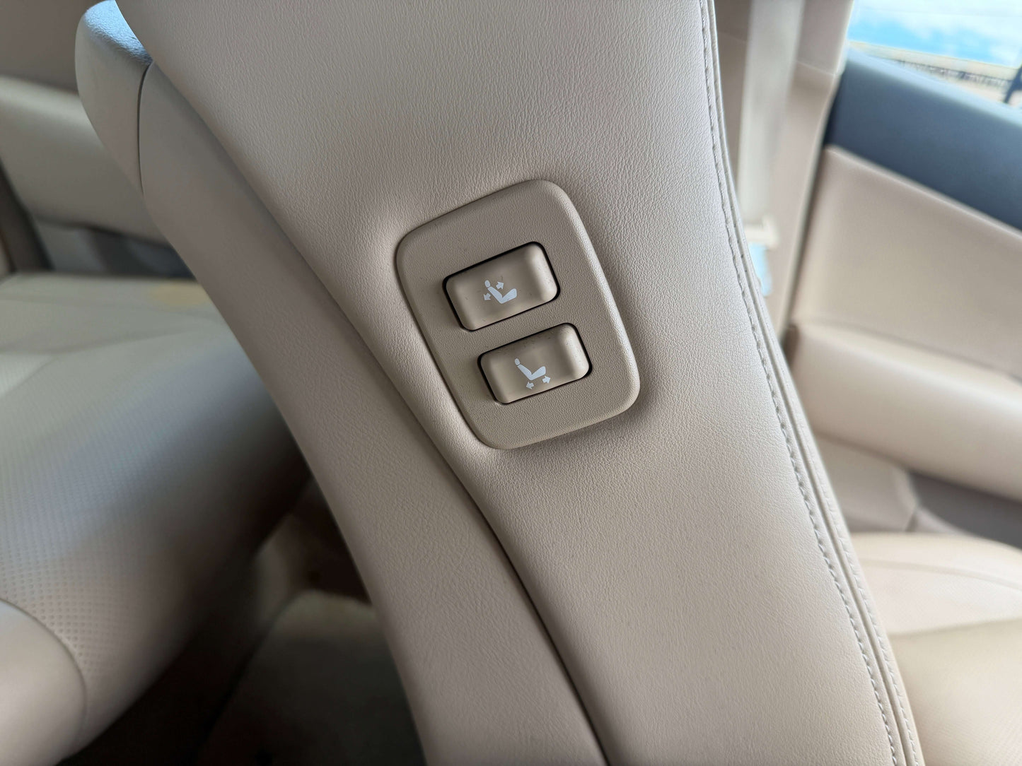 Adjustable seat controls in the 2010 Toyota Crown V6 3.0L Royal Saloon G Edition Luxury Sedan interior.