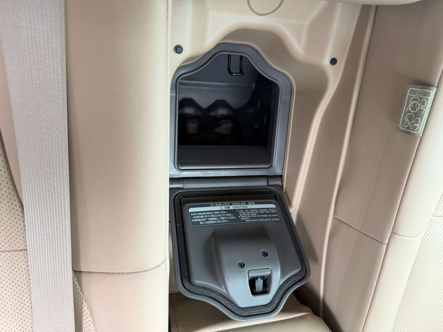 Interior view of the storage compartment in the 2010 Toyota Crown V6 3.0L Royal Saloon G Edition luxury sedan.