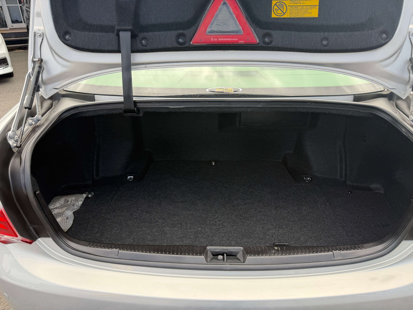 2010 Toyota Crown V6 3.0L Royal Saloon G Edition luxury sedan trunk space, showing ample storage area.