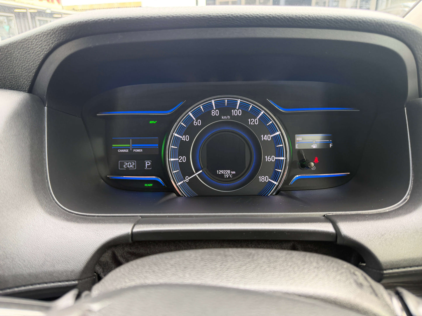 Dashboard display of a 2016 Honda Odyssey 2.0 Hybrid showing speedometer and fuel gauge.