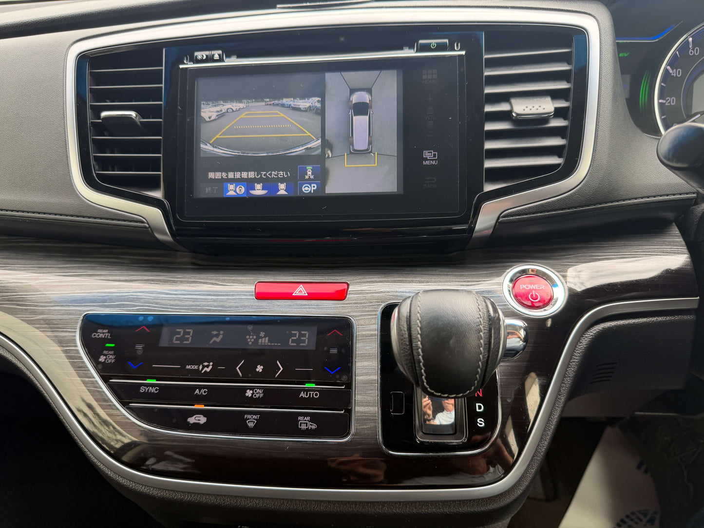 Interior dashboard of a 2016 Honda Odyssey 2.0 Hybrid showing touchscreen, controls, and digital display.