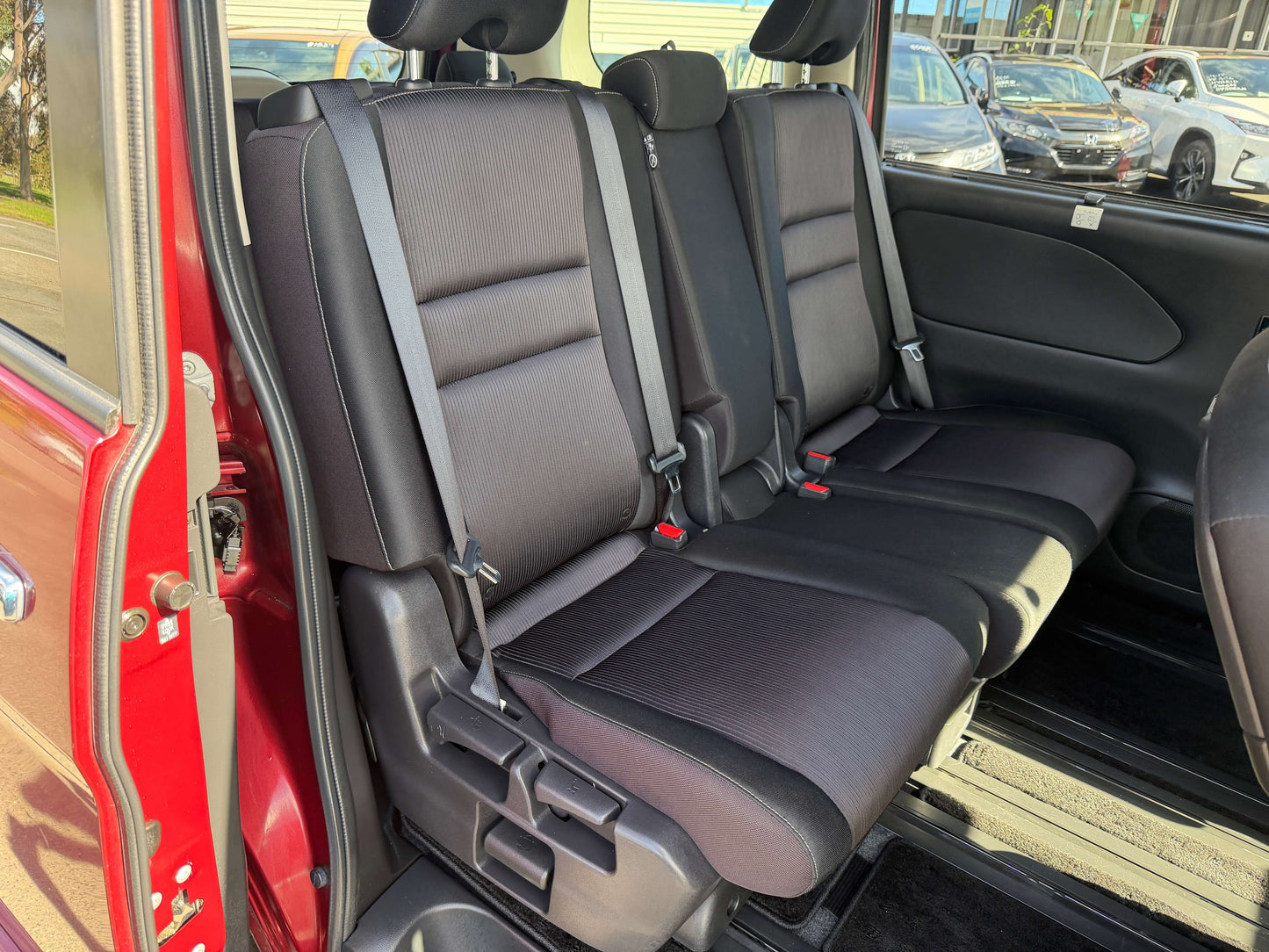 Interior view of the 2016 Nissan Serena 2.0L S-Hybrid Highway Star showing 8 seats in the second row.