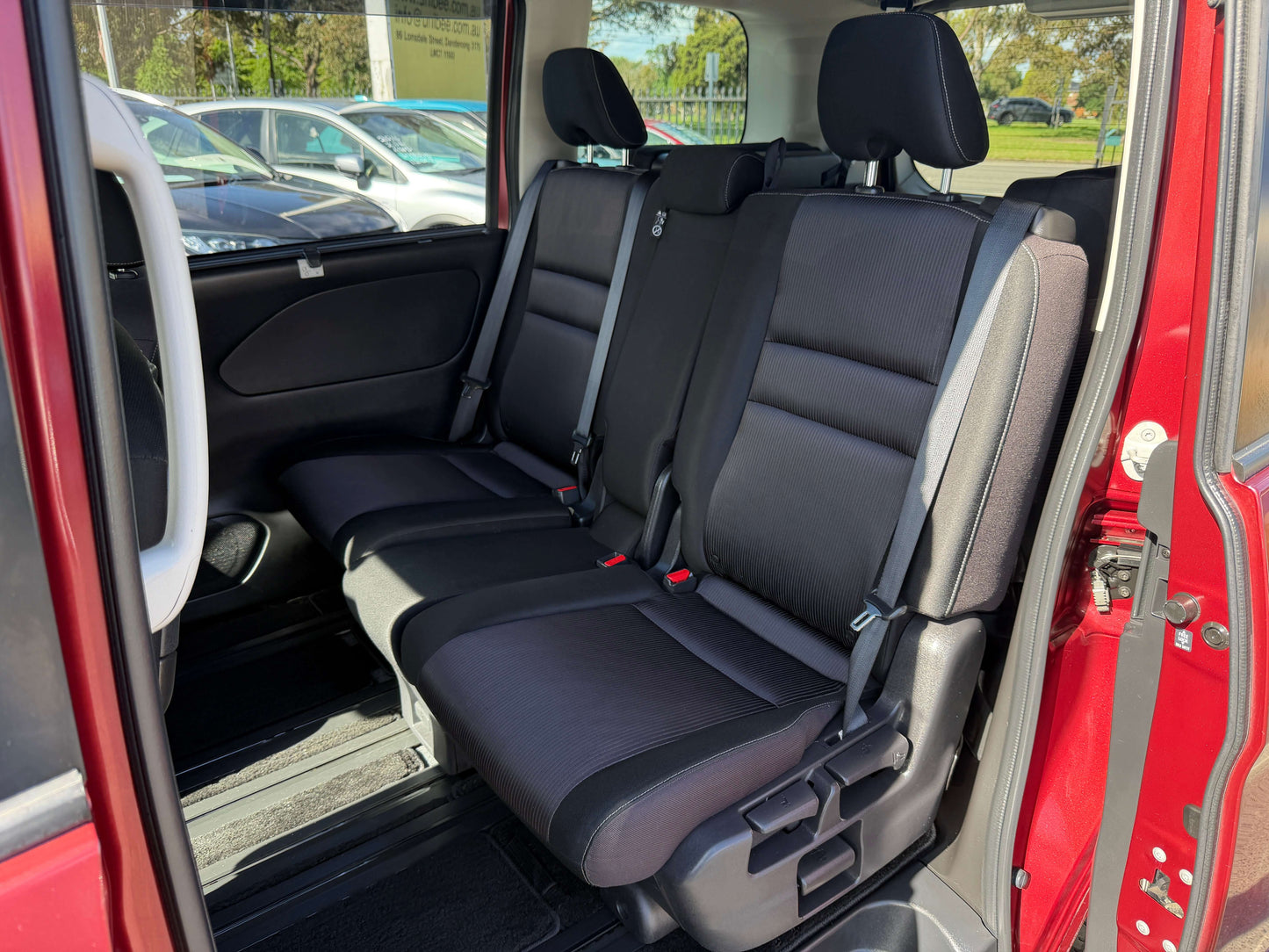 Interior view of the 2016 Nissan Serena 2.0L S-Hybrid featuring 8 seats and spacious rear seating area.