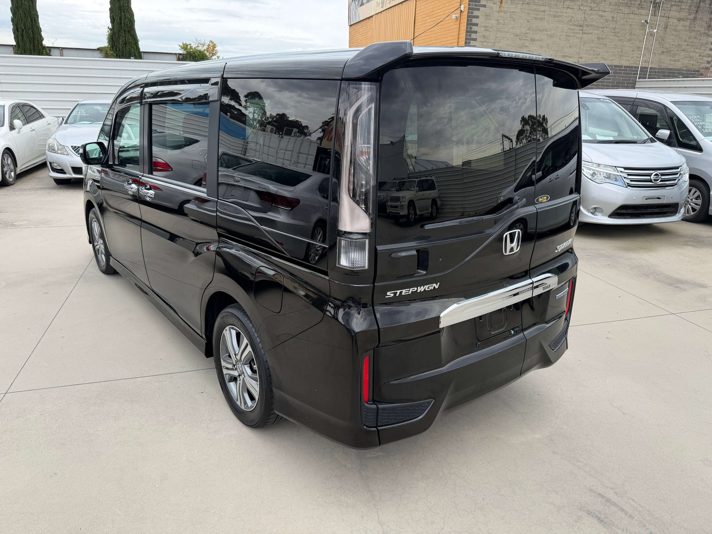 2018 Honda Stepwgn 2.0 Spada Hybrid G Honda Sensing rear view in black parked at dealership
