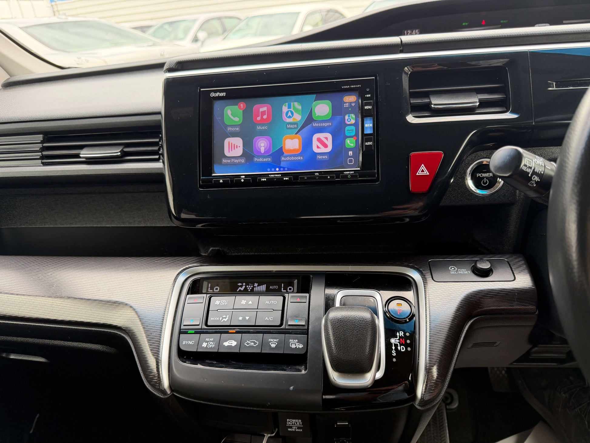 Interior view of 2018 Honda Stepwgn 2.0 Spada Hybrid G with touchscreen and control panel.