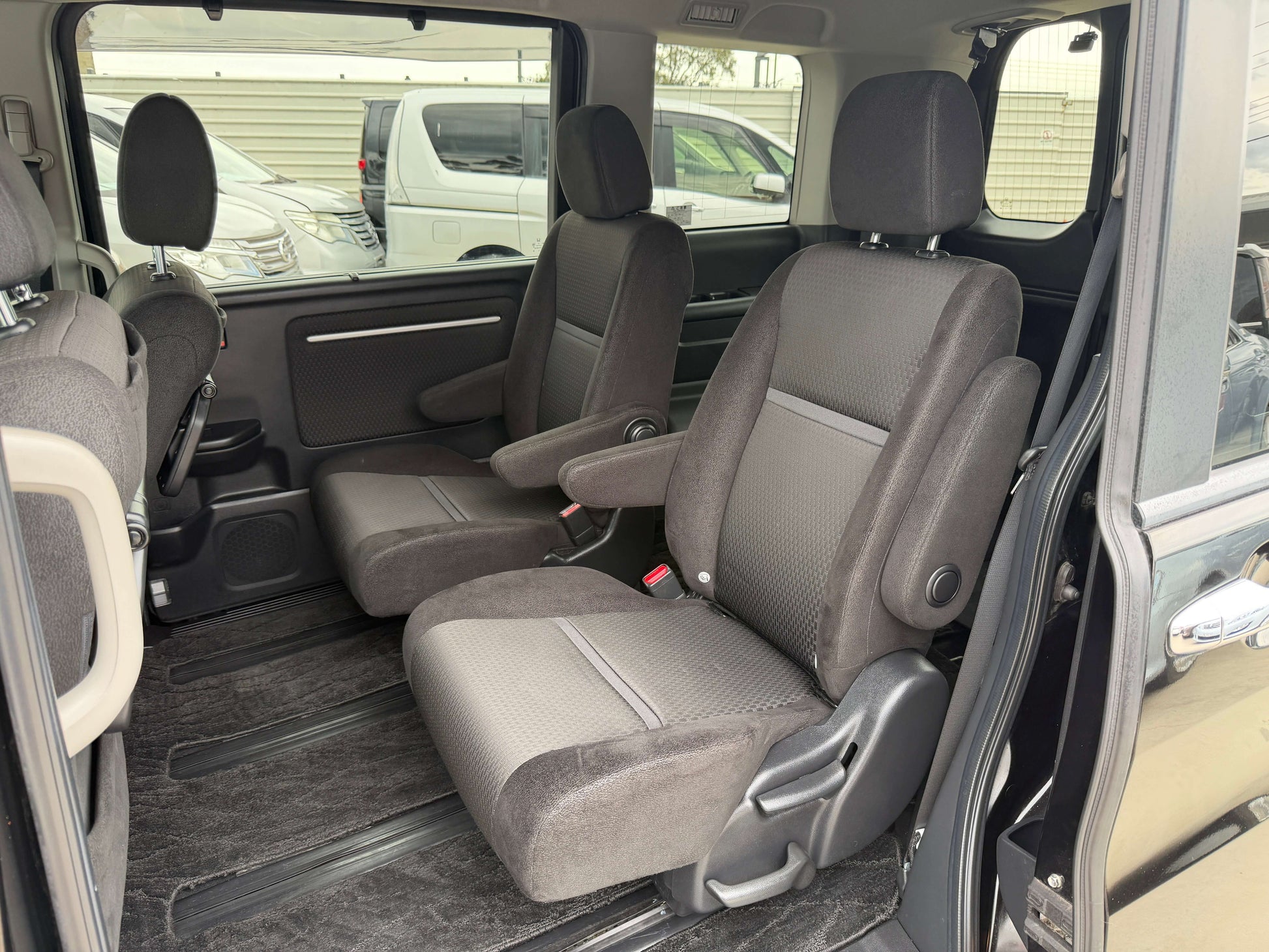 Interior view of 2018 Honda Stepwgn 2.0 Spada Hybrid showing spacious seating arrangement.