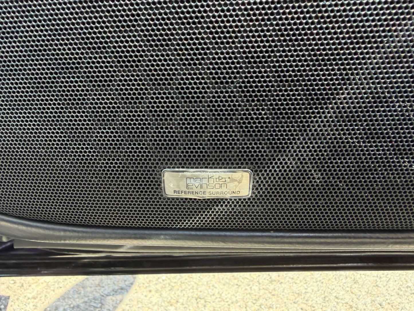 2007 Lexus LS600hL AWD V8 5.0L Hybrid Image of a Mark Levinson Reference Surround sound speaker grille in a luxury vehicle.