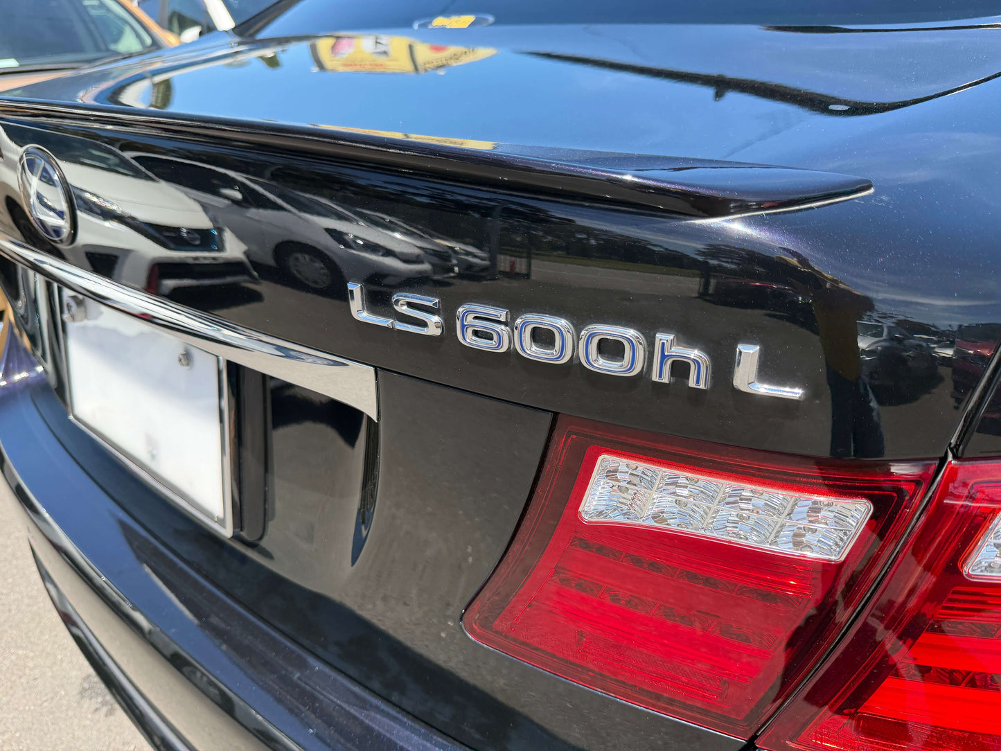 2007 Lexus LS600hL AWD V8 5.0L Hybrid badge on the rear of the luxury sedan.