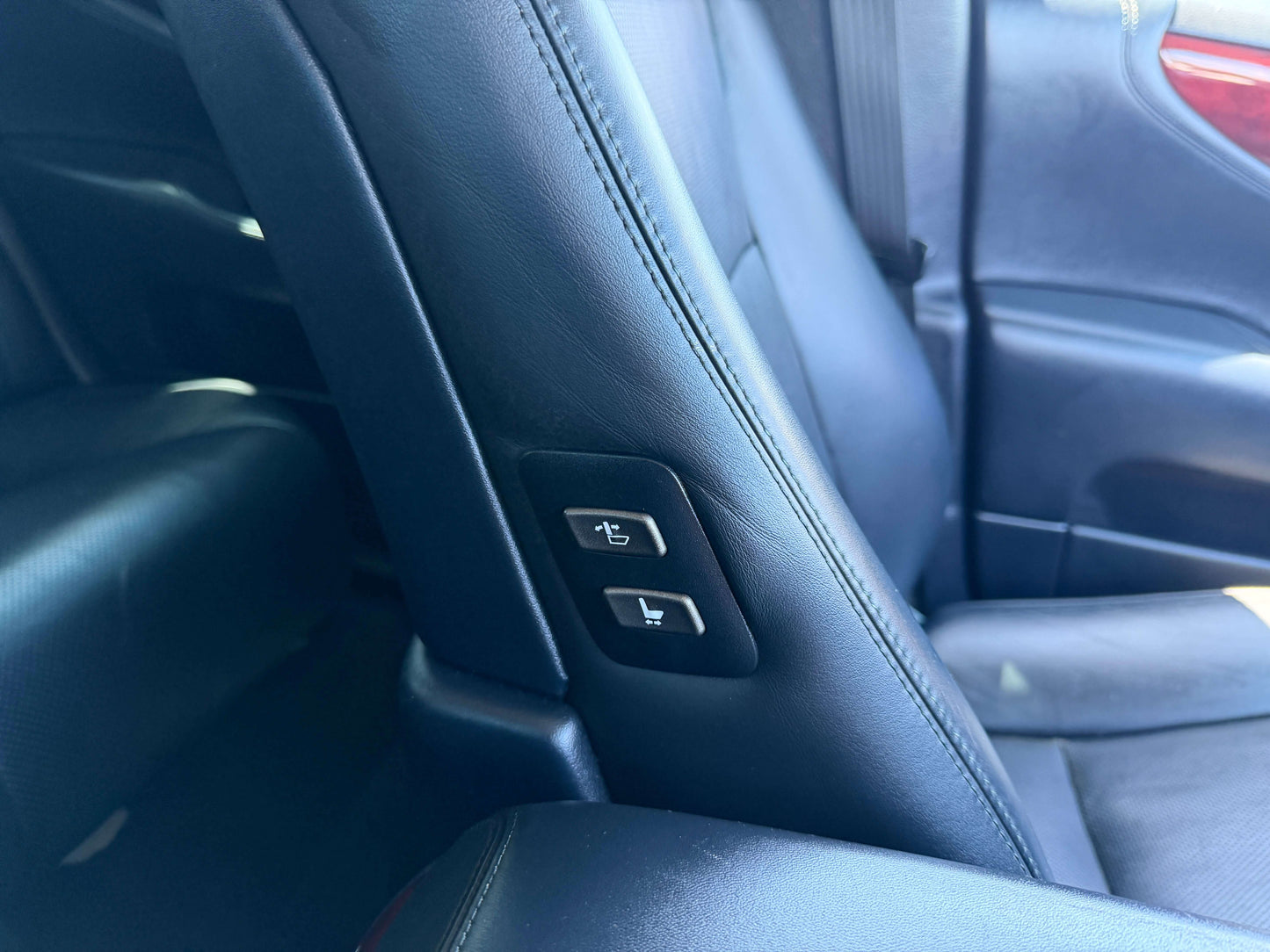 Interior view of the 2007 Lexus LS600h AWD V8 5.0L Hybrid showing seat adjustment controls.