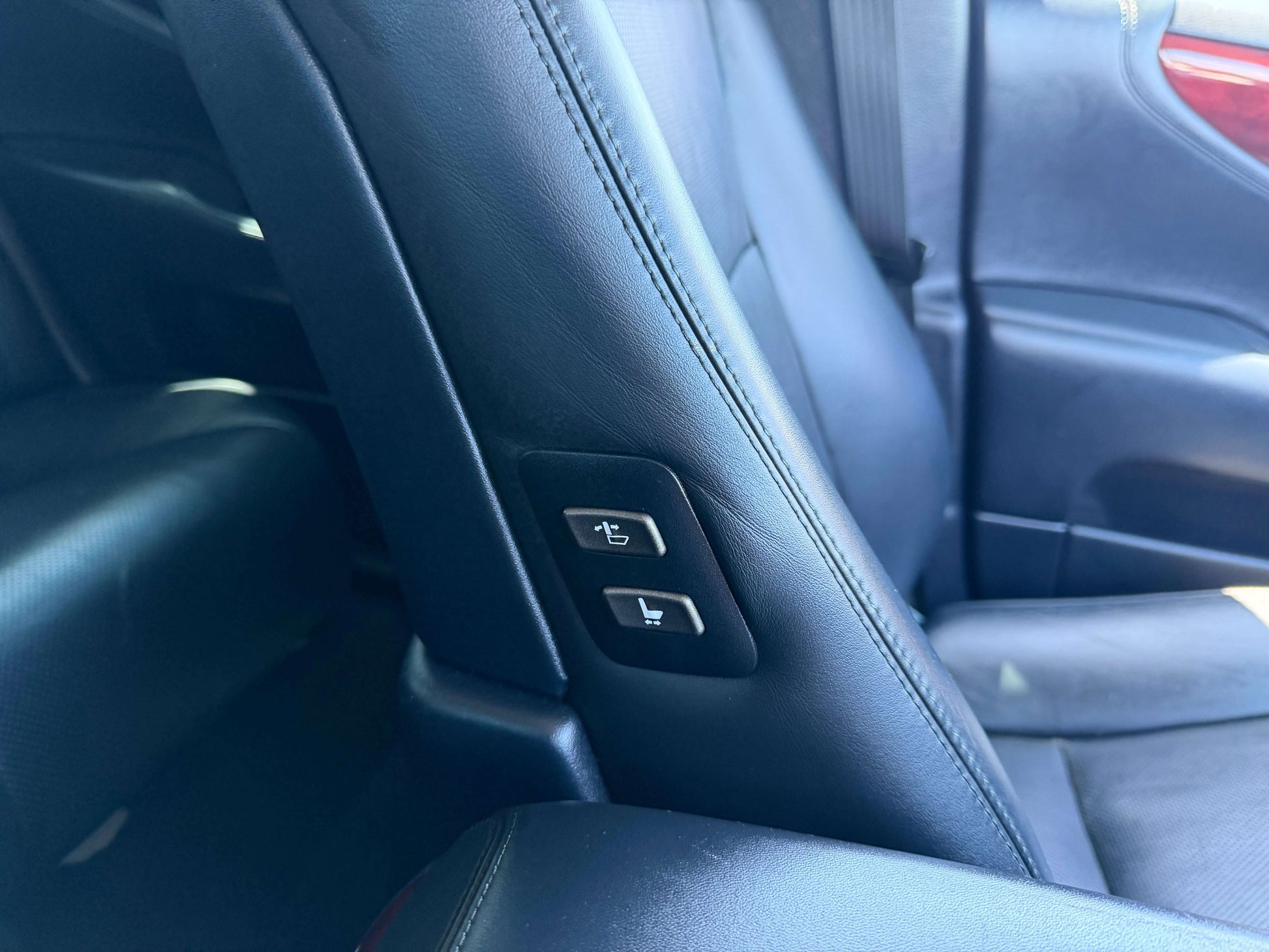 Interior view of the 2007 Lexus LS600h AWD V8 5.0L Hybrid showing seat adjustment controls.