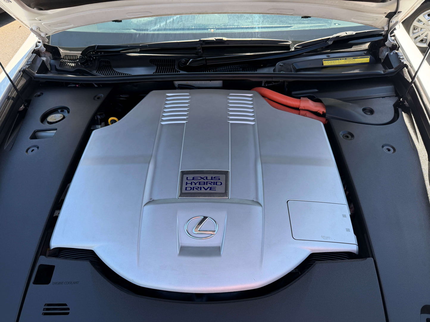 2007 Lexus LS600h AWD V8 5.0L Hybrid engine compartment view showcasing hybrid technology and performance features.