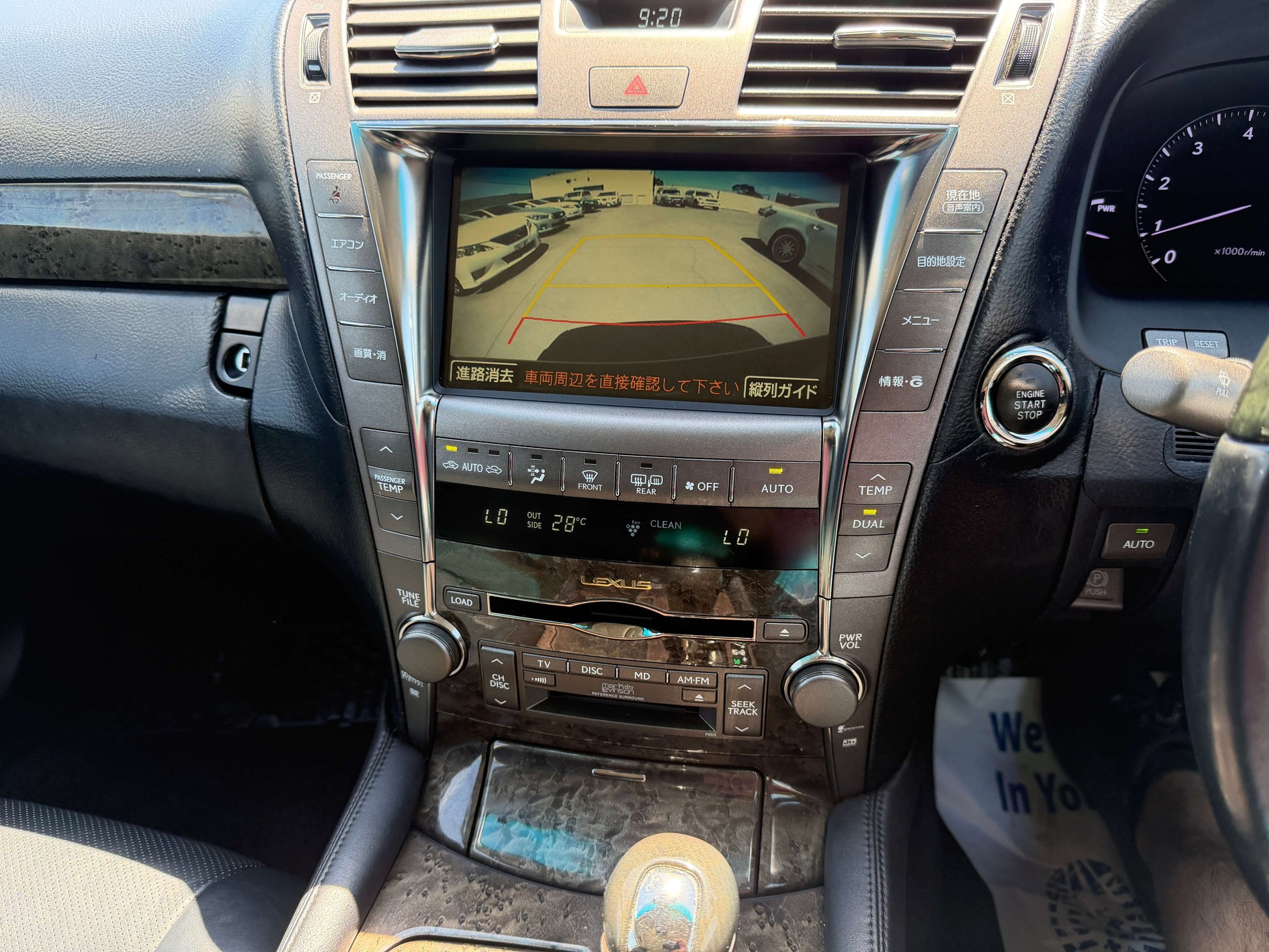 Interior view of 2007 Lexus LS600h AWD V8 5.0L Hybrid showing dashboard and navigation screen.
