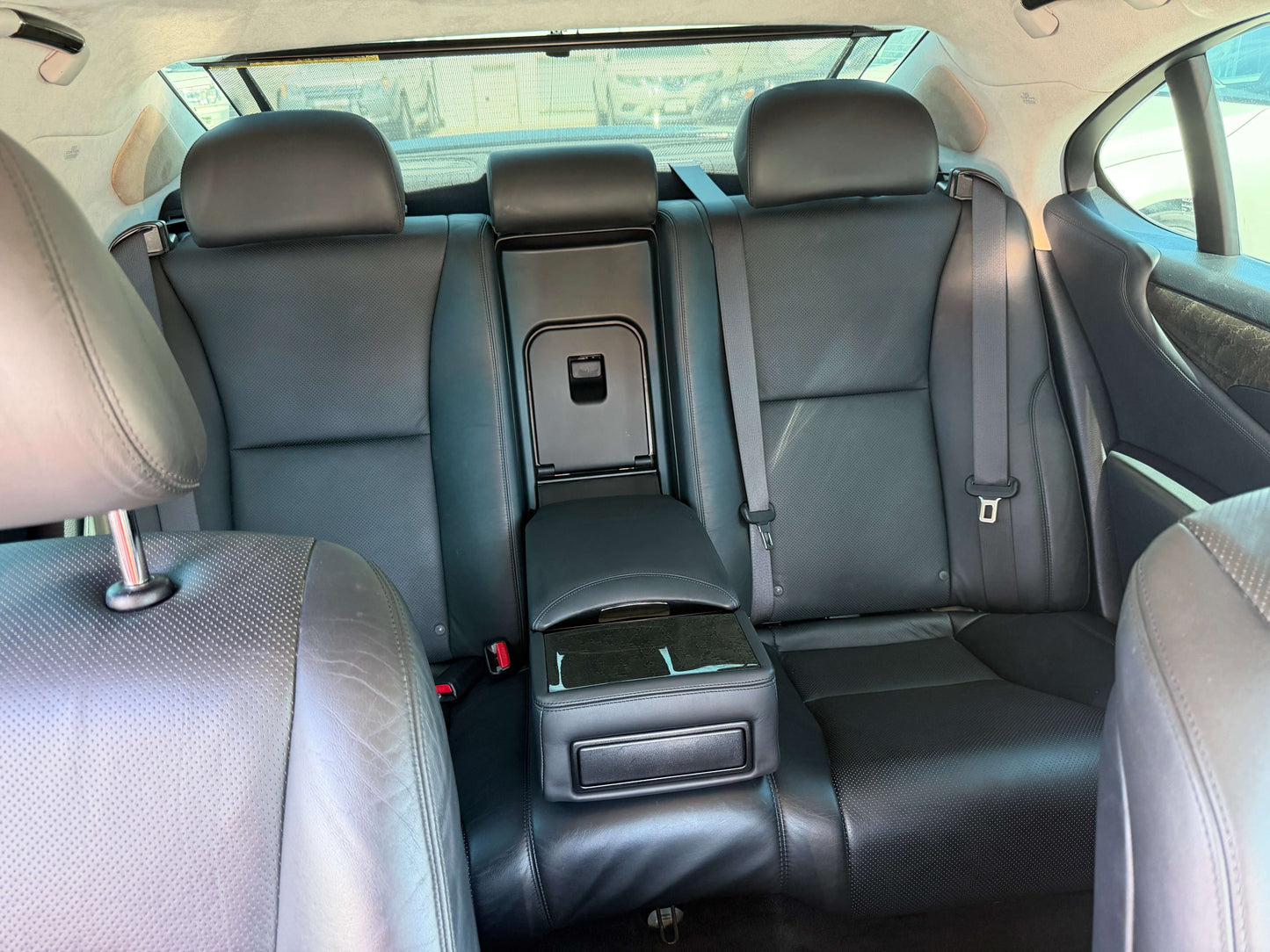 Interior view of the backseat in a 2007 Lexus LS600h AWD V8 5.0L Hybrid luxury sedan.