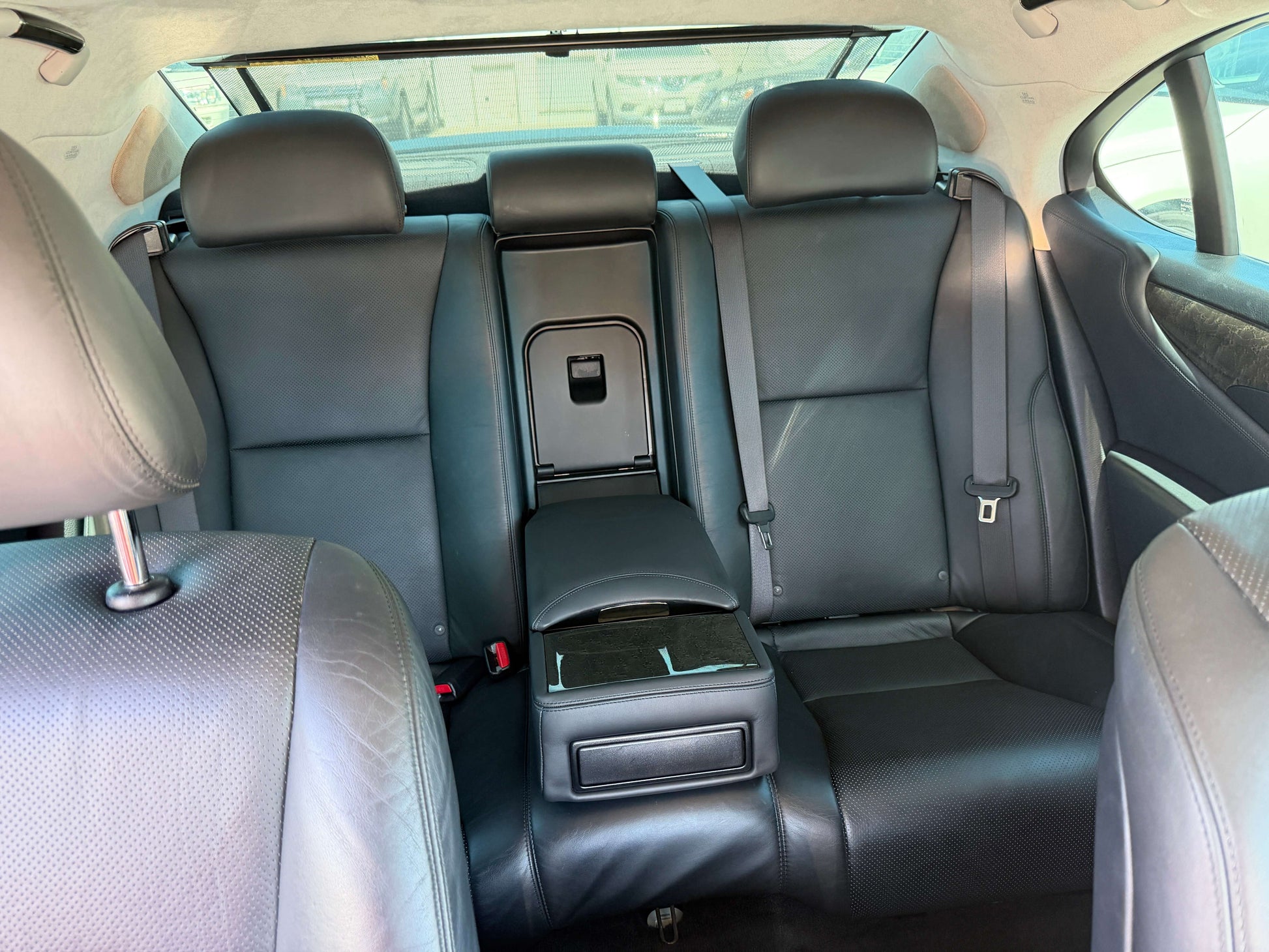 Interior view of the backseat in a 2007 Lexus LS600h AWD V8 5.0L Hybrid luxury sedan.
