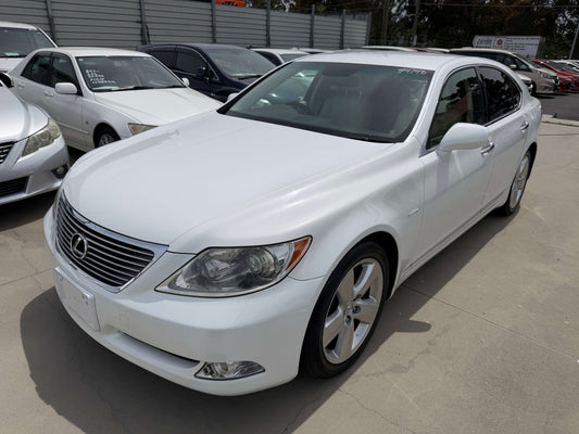 2007 Lexus LS460 V8 4.6L Version S I Package Luxury Sedan in white, showcasing its elegant design and premium features.