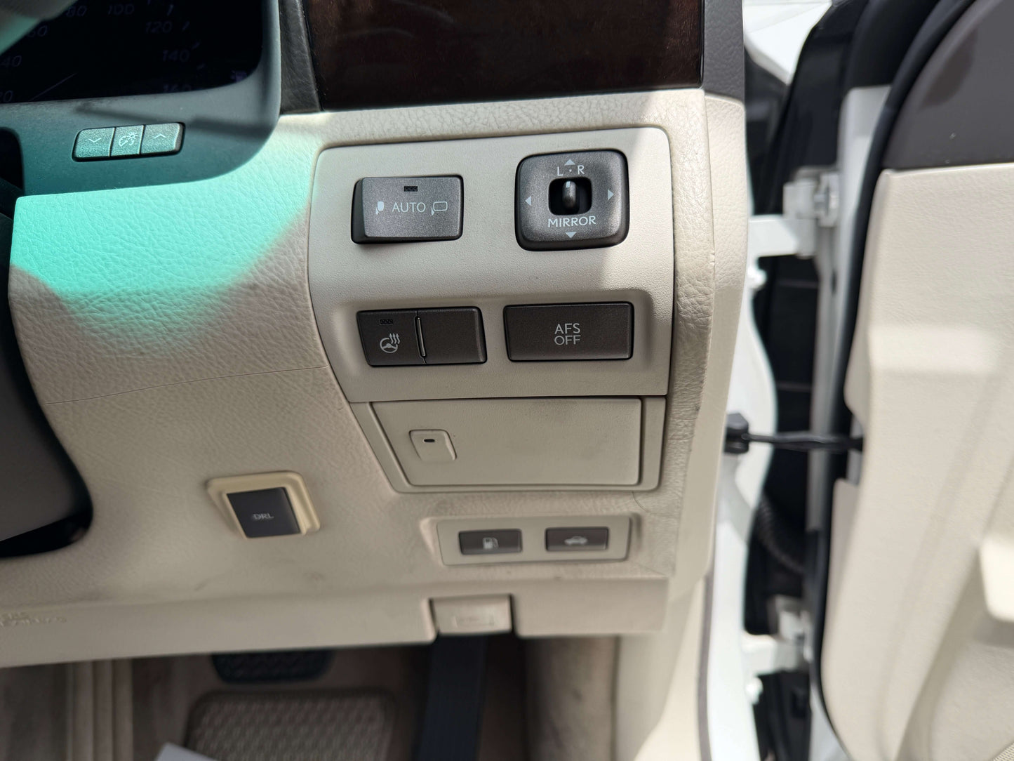 2007 Lexus LS460 V8 4.6L interior controls and buttons near the driver's door.