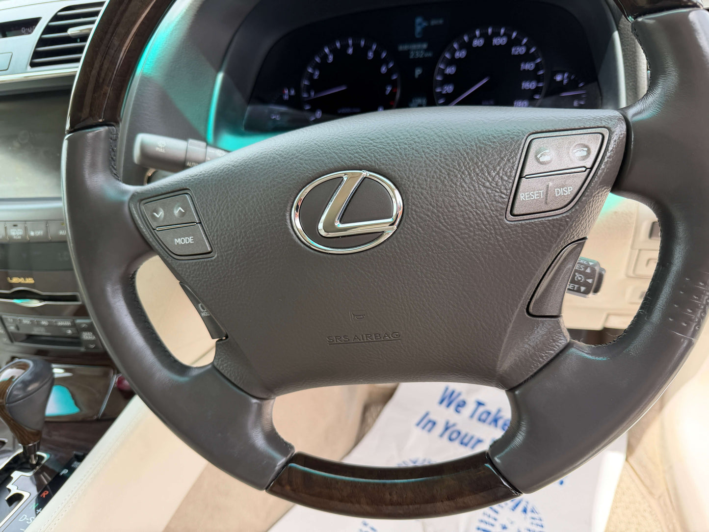 2007 Lexus LS460 V8 4.6L steering wheel with control buttons and luxury interior features