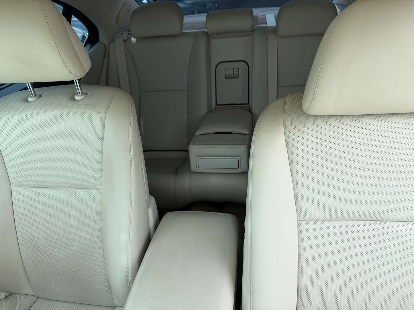 2007 Lexus LS460 V8 4.6L interior view showing luxurious beige leather seating in rear cabin.