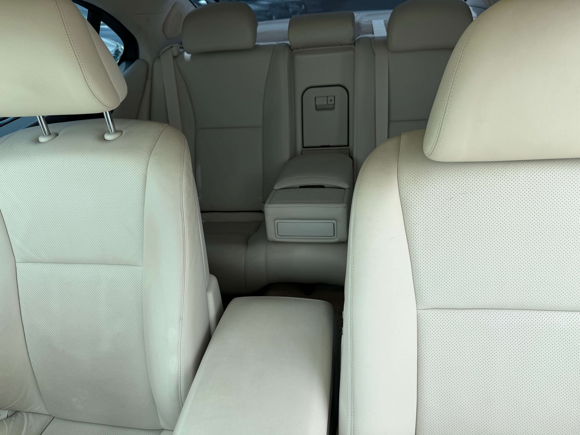 2007 Lexus LS460 V8 4.6L interior view showing luxurious beige leather seating in rear cabin.