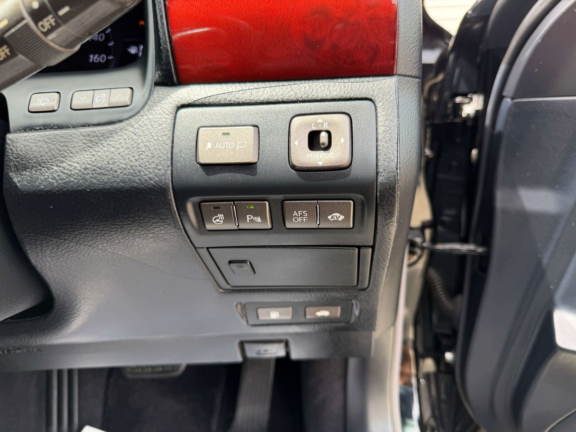 2007 Lexus LS600hL AWD V8 5.0L Hybrid interior controls and buttons for luxury features.