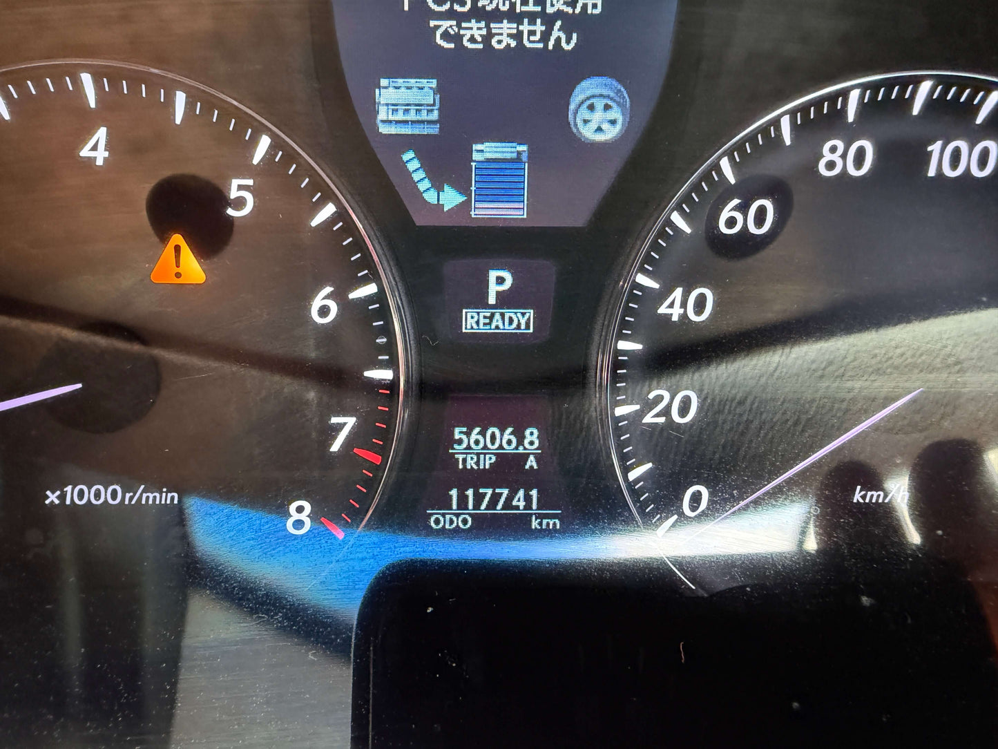 2007 Lexus LS600hL AWD V8 5.0L Hybrid odometer display showing 117741 km and trip A at 5606.8 km.