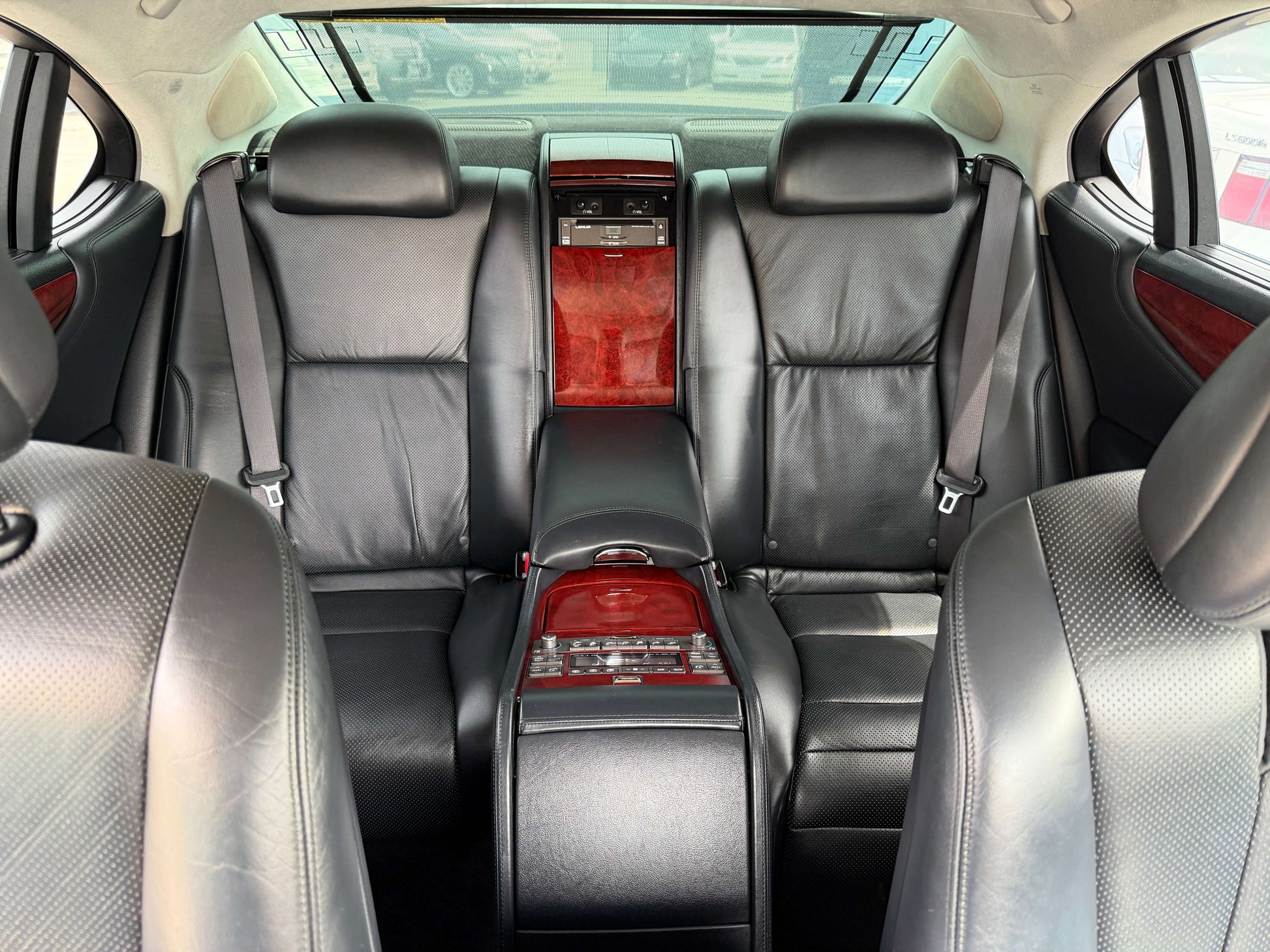 Interior view of the 2007 Lexus LS600hL AWD V8 5.0L Hybrid luxury sedan showcasing premium leather seats.