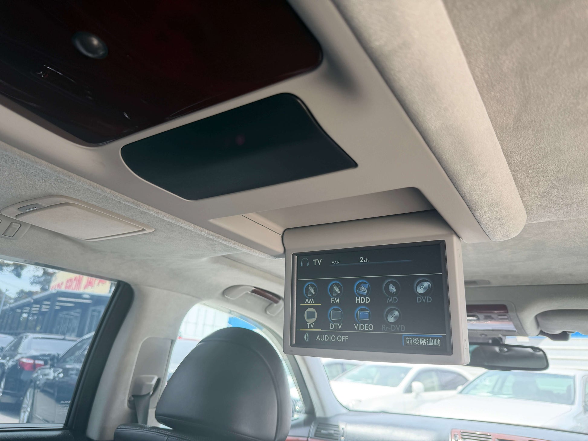 Interior view showing the entertainment system in the 2007 Lexus LS600hL AWD V8 5.0L Hybrid luxury sedan.