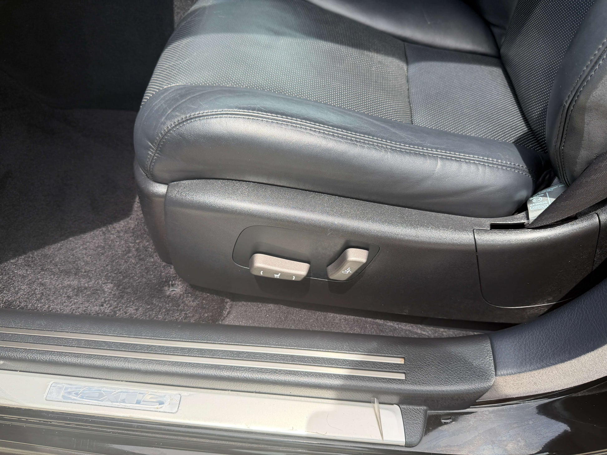 Close-up of the adjustable leather seat in a 2007 Lexus LS600hL AWD V8 5.0L Hybrid luxury sedan.