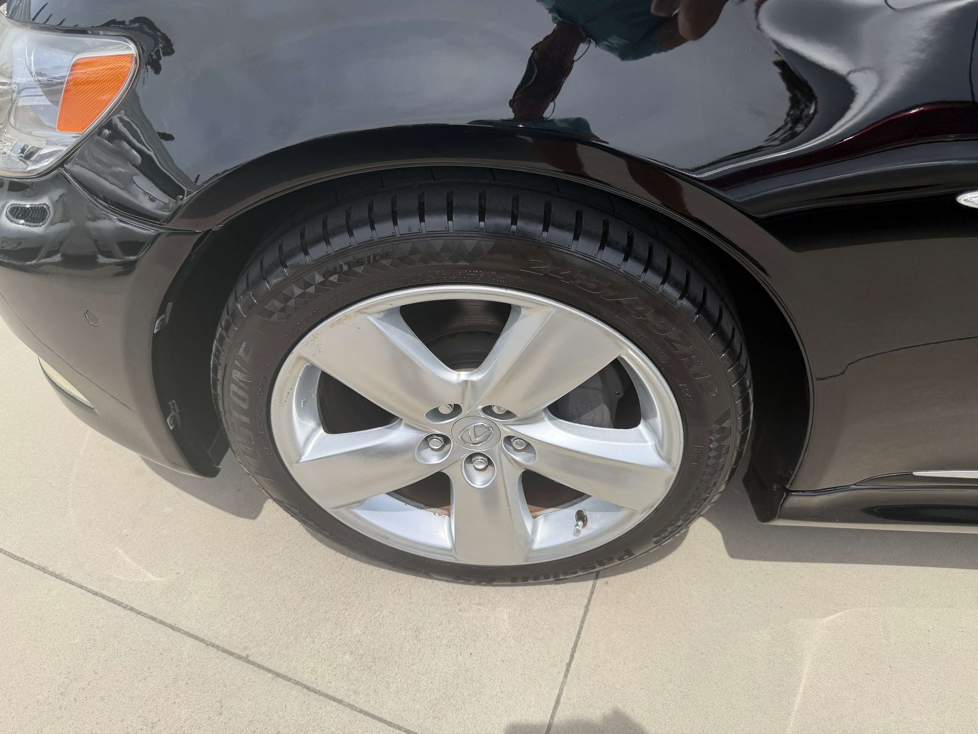 2007 Lexus LS600hL AWD V8 5.0L Hybrid luxury sedan close-up of alloy wheel and tire.