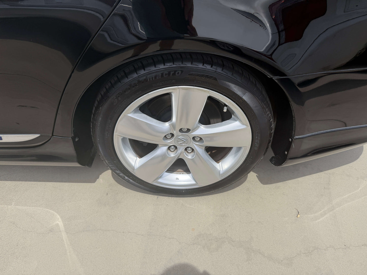 Close-up of the wheel and tire of a 2007 Lexus LS600hL AWD V8 5.0L Hybrid luxury sedan.