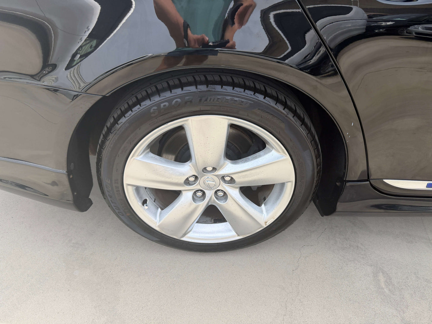 2007 Lexus LS600hL AWD V8 5.0L Hybrid luxury sedan close-up view of passenger side tire and alloy wheel.