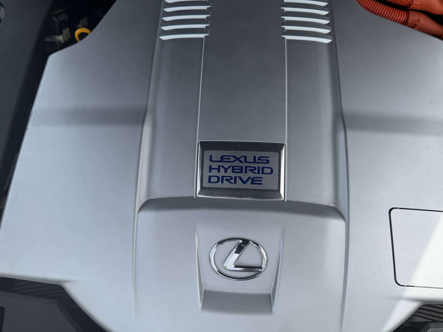 2007 Lexus LS600hL AWD V8 5.0L Hybrid engine with Lexus Hybrid Drive badge.