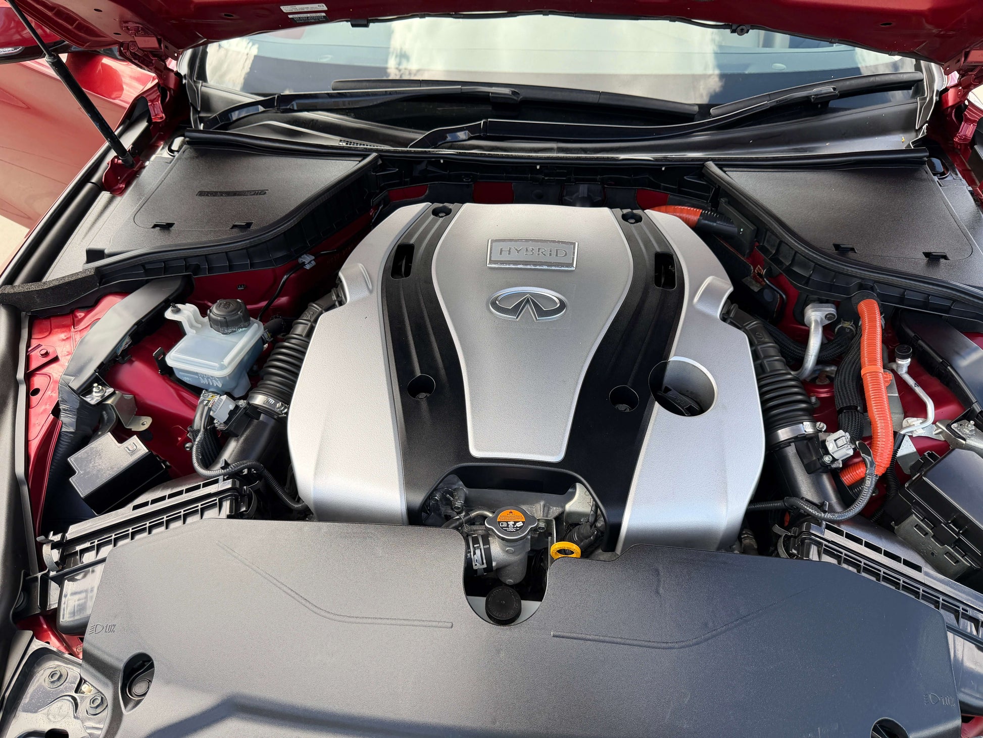 2015 Nissan Skyline V6 3.5L Hybrid engine view showcasing its powerful design and efficient technology.