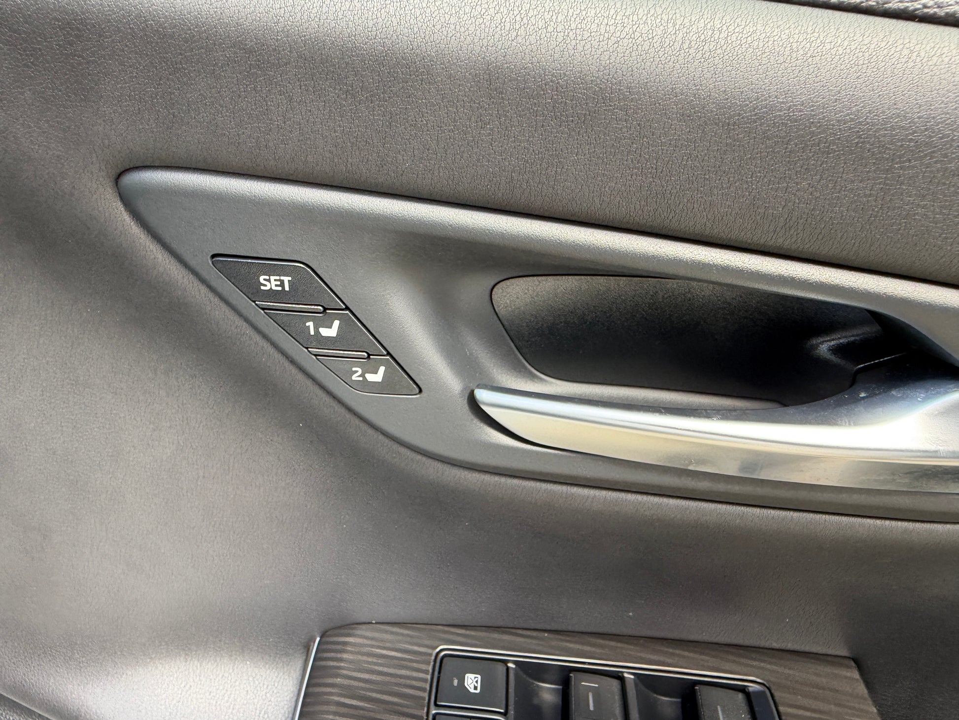 Control panel for seat adjustment in the 2019 Toyota Crown 2.5L Hybrid G Executive Edition luxury sedan.