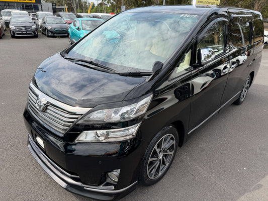 2010 Toyota Vellfire 2.4L V Edition luxury people mover in black, showing stylish exterior design and features.