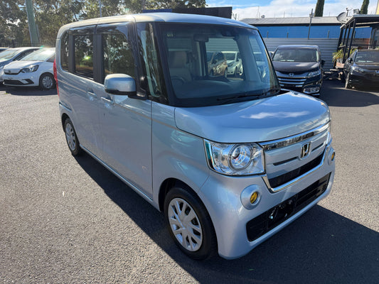 2020 Honda N-Box 660 G L Honda Sensing in silver color parked with other cars.